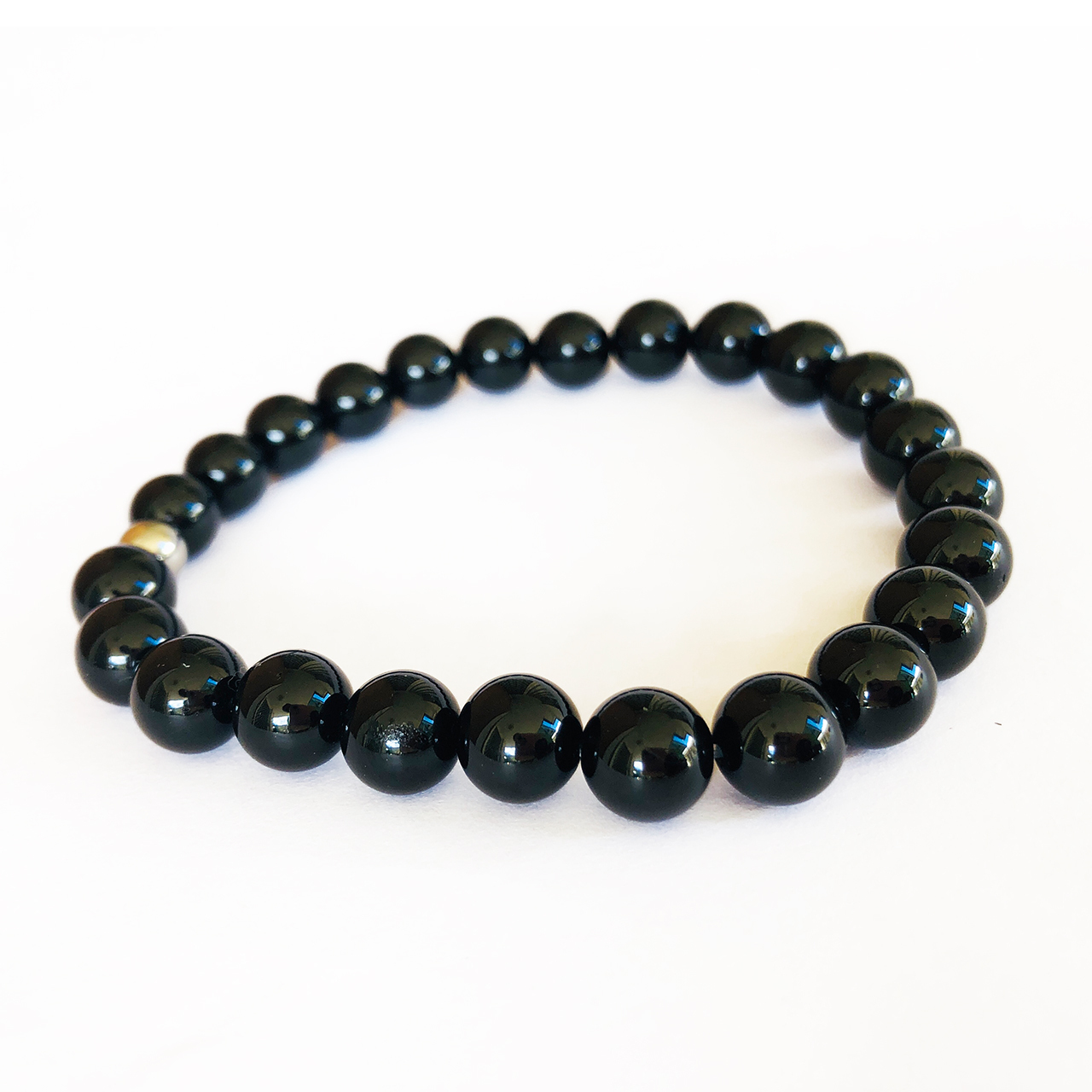 Black Tourmaline bracelet on white background