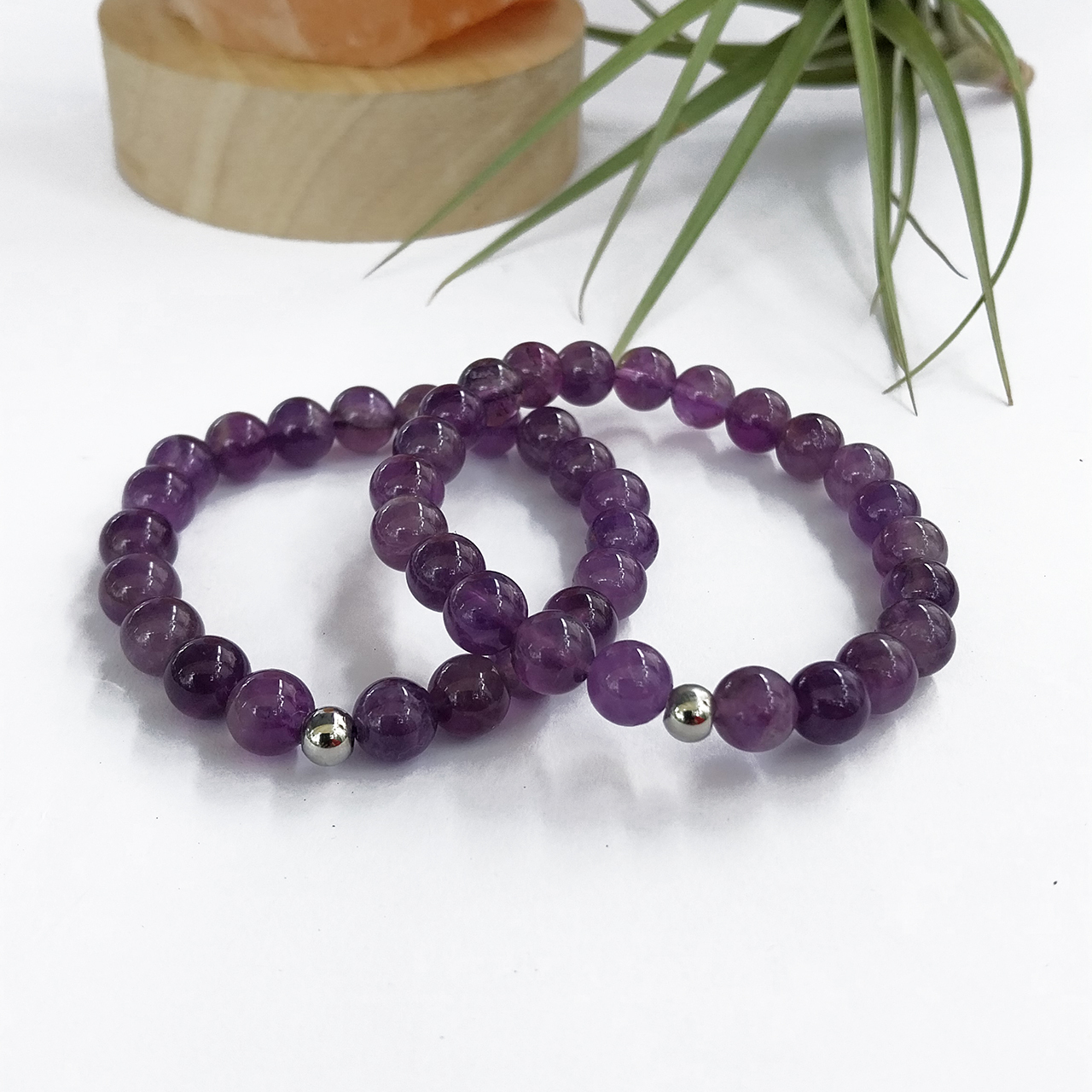 Amethyst Bead Bracelets on white background