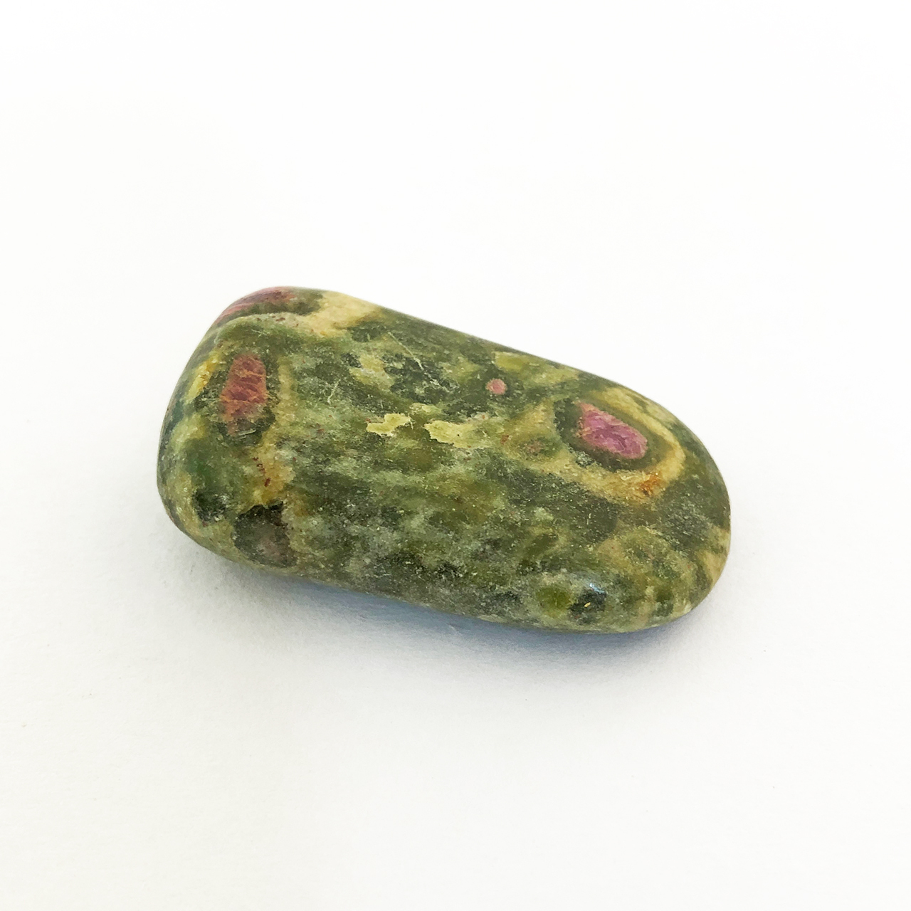 Ruby Fuchsite tumble on a white background