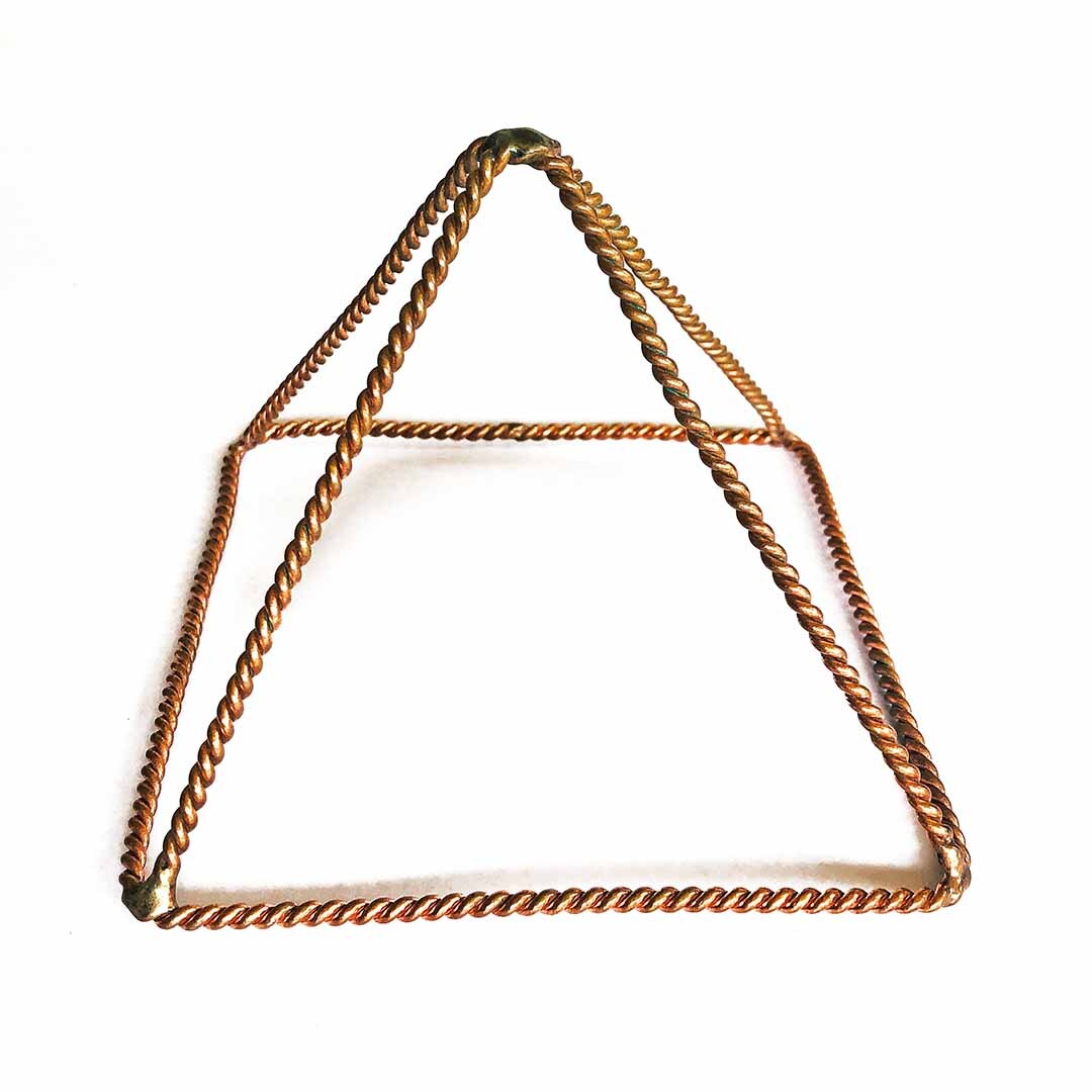 Copper Tensor Pyramid on white background