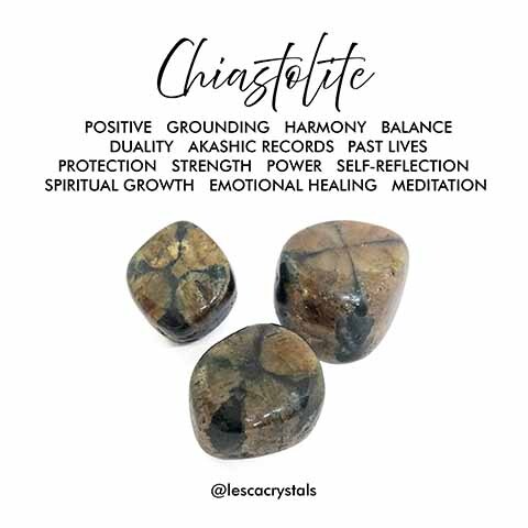 Chiastolite stones and text meaning on white background
