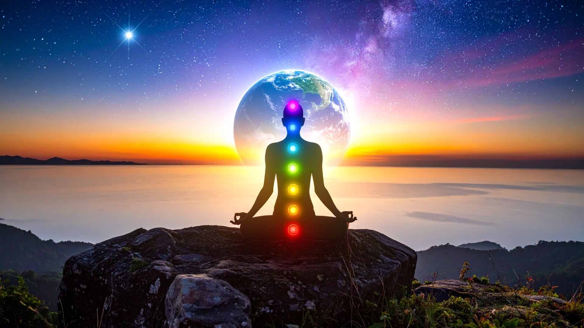 Chakra Balance Meditation Meditating by the ocean landscape