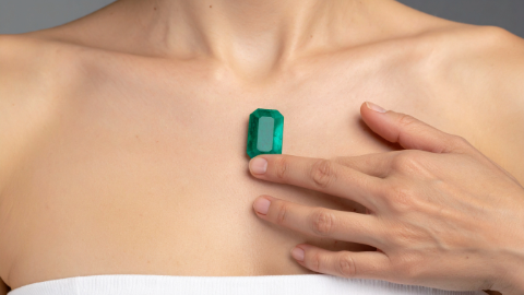 Holding Emerald to Sternum Holding Emerald to Sternum