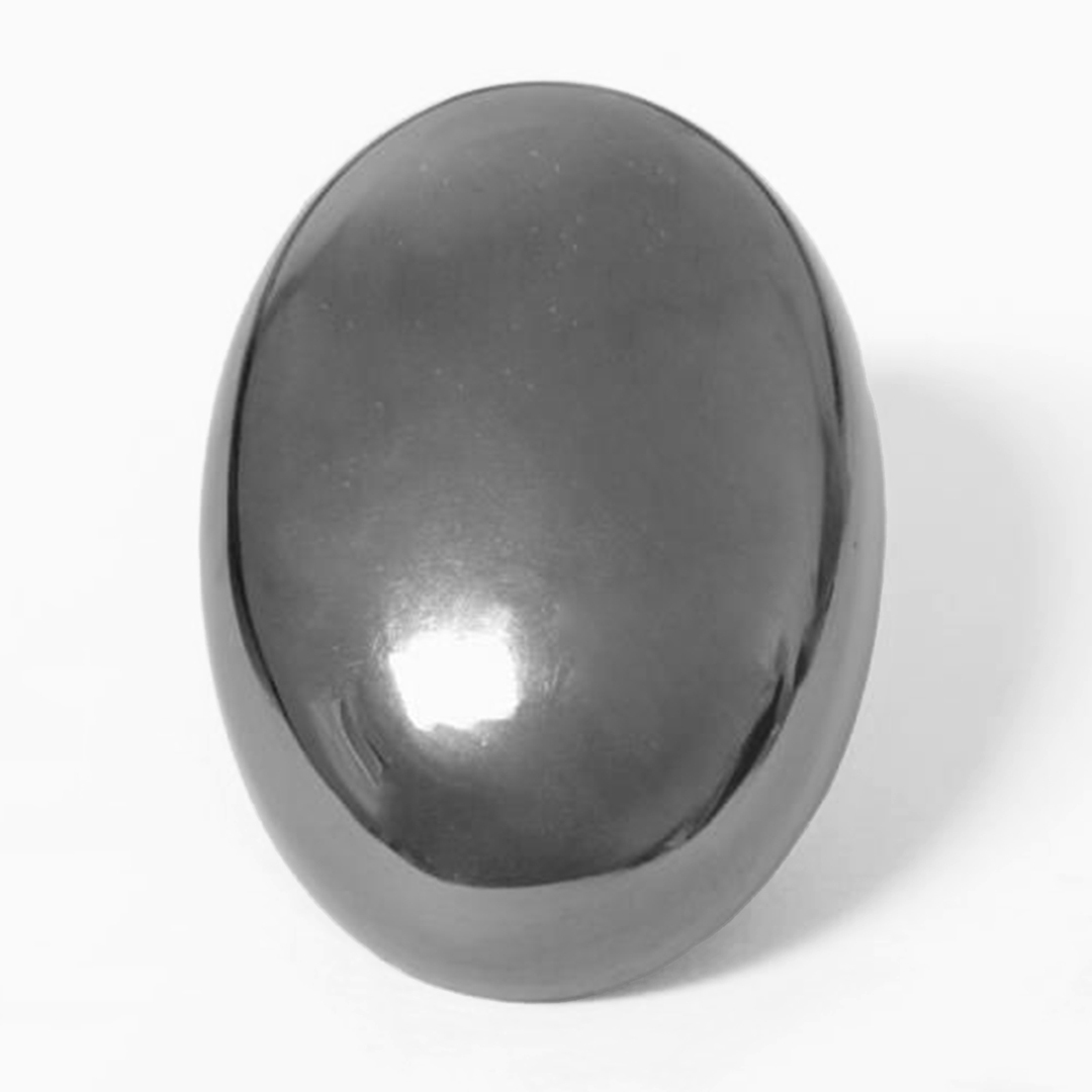 Hematite palmstone on white background