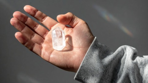Crystal in palm of hand