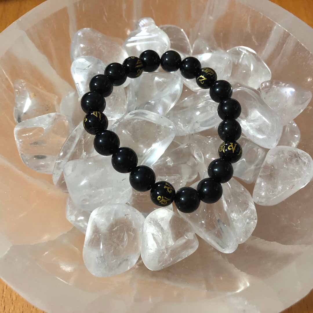 Selenite bowl with quartz tumbles and obsidian bracelet