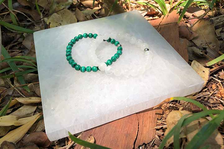 Malachite and Quartz bracelets on Selenite Plate Malachite and Quartz bracelets on Selenite Plate