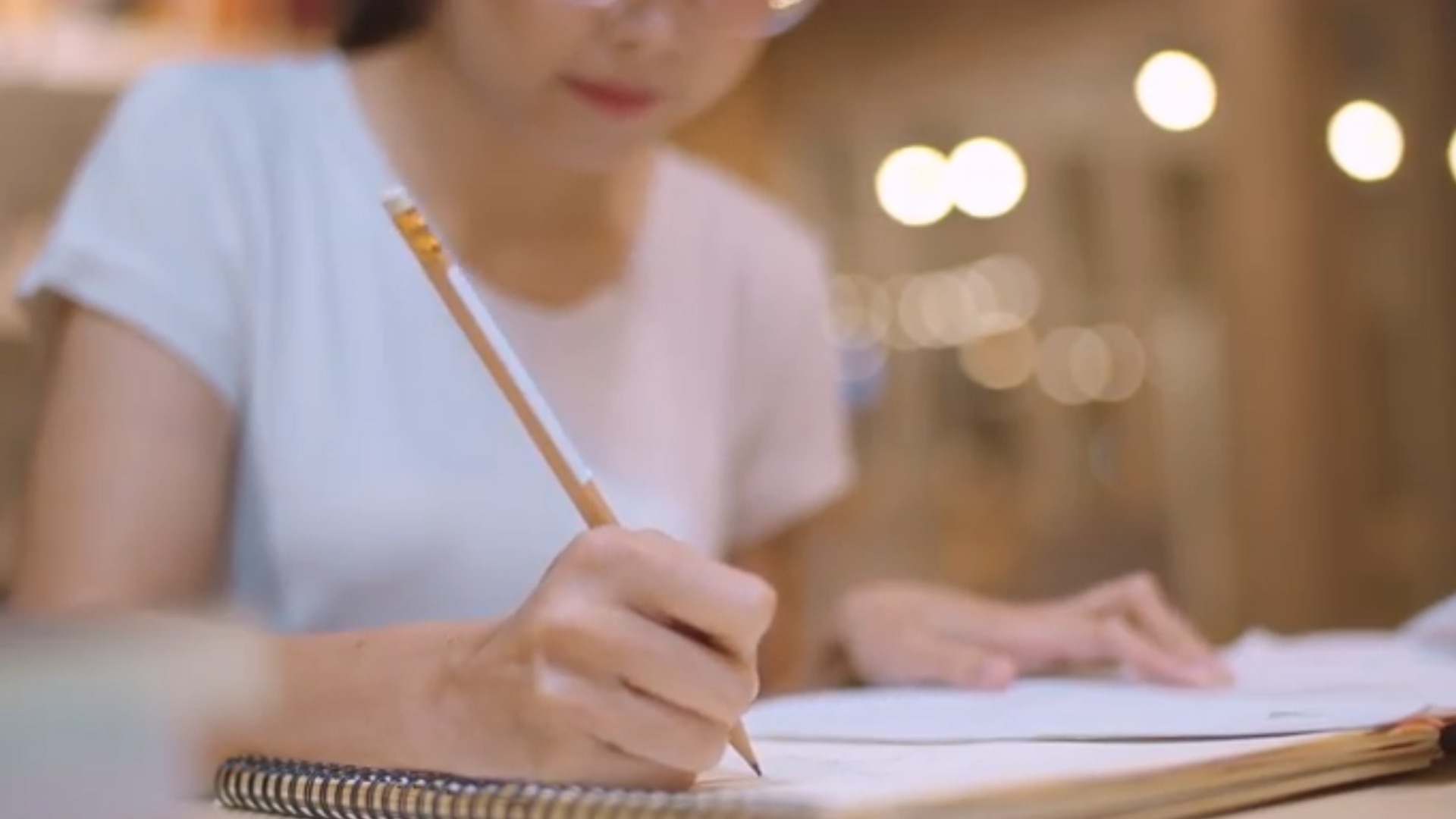 Writing with pencil on paper