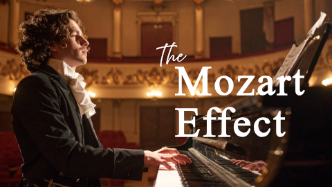 Man playing a grand piano Man playing a grand piano